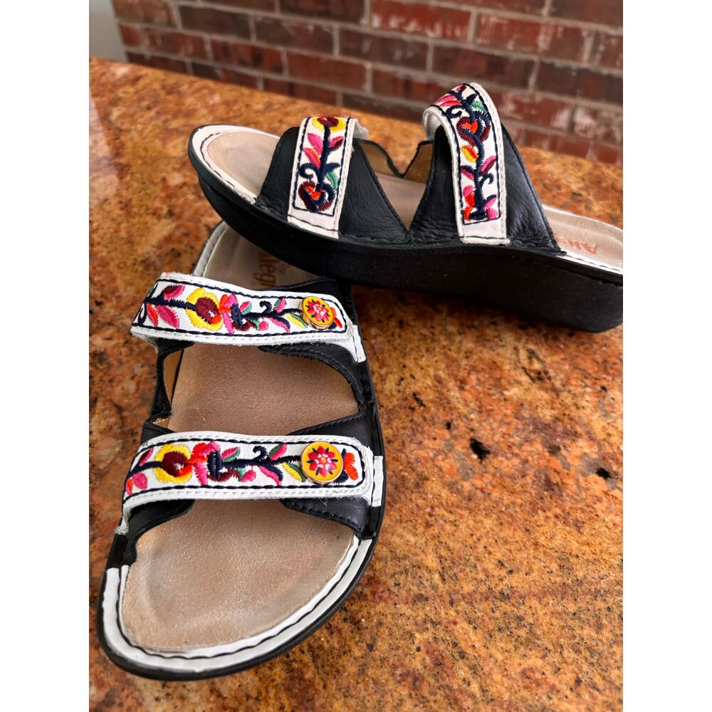 Alegria Clara adjustable strap slide sandals featuring embroidered floral